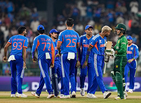 Indian players celebrate a wicket