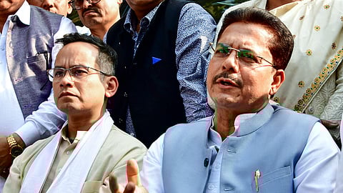 Former Assam Pradesh Congress Committee president Bhupen Kumar Borah addresses a press conference after submitting his resignation to the party high command, in Guwahati, Monday, Feb. 16, 2026. Congress leader Gaurav Gogoi is also seen