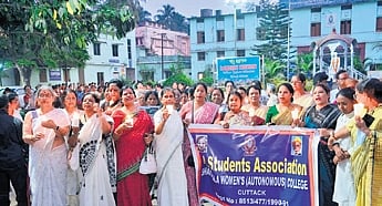 Students & alumni holding candlelight march at Shailabala Women’s College