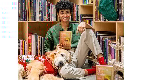 Shantanu Naidu with Winter, the golden retriever who inspired his book
