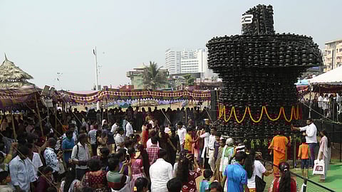 Former union minister T. Subbarami Reddy performing Abhishekam at the 41st Maha Kumbhabhishekam of Kotilingalu at the R.K. Beach in Visakhapatnam on Sunday.
