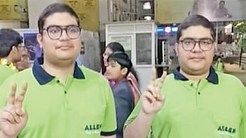 They appeared for the BE/BTech paper of the session-I together and scored the same 99.98 percentile.