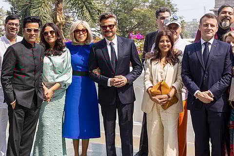 In this image posted on Feb. 17, 2026, French President Emmanuel Macron with Bollywood actors Anil Kapoor, Manoj Bajpayee and others during a meeting, in Mumbai.