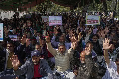 Jammu And Kashmir Employees Joint Action Committee Held A Convention In Srinagar Daily wagers and casual laborers from various government departments shout slogans during a convention demanding the regularization of their services and a salary hike in Srinagar, Jammu and Kashmir, on October 16, 2025. 