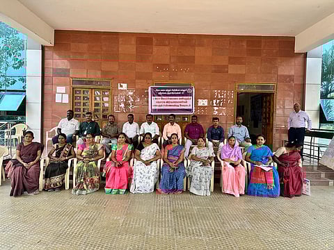 Guest lecturers protesting at the entrance of the Government Arts and Science College in Srirangam on Wednesday.