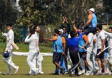 J&K players carry their coach Ajay Sharma on their shoulders after their win over Bengal in the semifinal on Wednesday 