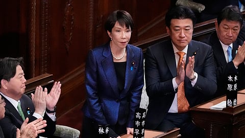 Japanese Prime Minister Sanae Takaichi, center, is applauded by members of the lower house of Japan's parliament as Takaichi was reelected as prime minister during a special session in Tokyo, Japan, Wednesday, Feb. 18, 2026.