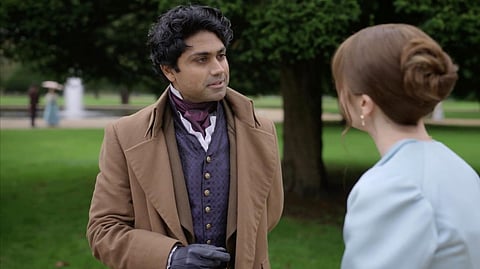 A still from Bridgerton Season 4 featuring Mikhail Sen and Claudia Jessie