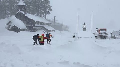This image provided by the Nevada County Sheriff's Office shows members of a rescue team in Soda Springs, California, on Tuesday, Feb. 17, 2026.