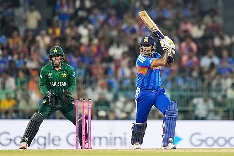 Suryakumar Yadav (R) plays a shot against Pakistan on Sunday