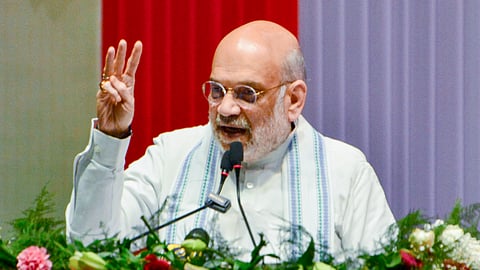 Union Home Minister Amit Shah speaks during the inauguration of Raj Bhasha books at the Joint Regional Official Language Conference of the East, North East and North regions, at Badharghat International Fair Ground, in Agartala, Friday, Feb. 20, 2026