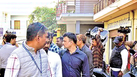 CCB police take custody of evidence during the raid at RTI activist Snehamayi Krishna’s residence and office in in Bandipalya, Mysuru, on Friday 