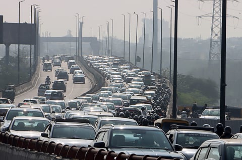 Vehicles stuck in a traffic jam on the Barapullah Flyover, in New Delhi on Thursday. 
