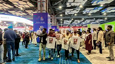 In this image received on Feb. 20, 2026, Indian Youth Congress (IYC) workers stage a 'shirtless protest' in AI summit.