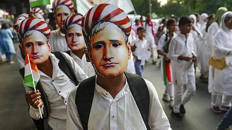 Student participating in a rally to commemorate 150 years of 'Vande Mataram' in Kolkata