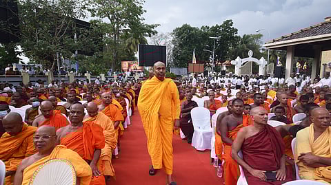 Buddhist monks gather to stage a protest demanding more respect from the government, in Colombo, Sri Lanka, Friday, Feb. 20, 2026. 