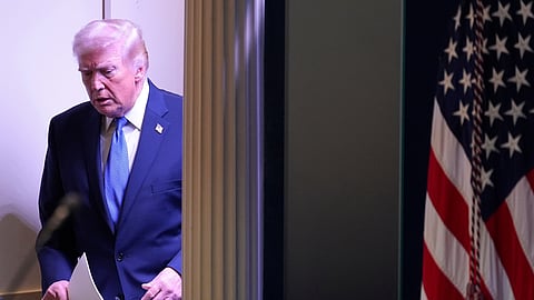 President Donald Trump walks into the James Brady Press Briefing Room at the White House to speak to members of the media, Friday, Feb. 20, 2026, in Washington.