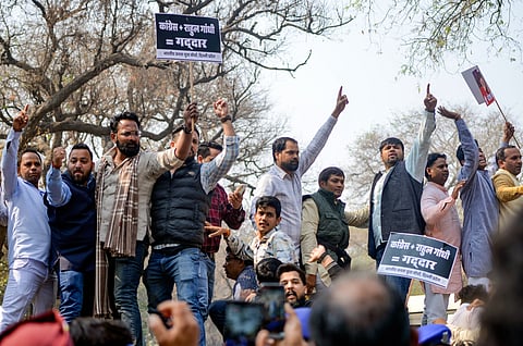 BJP workers protest against Congress youth wing's "shirtless" protest at the India AI Impact Summit, 2026.