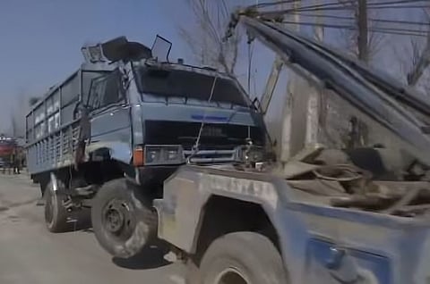 The vehicle fell into the river after the driver lost control of it, officials said.