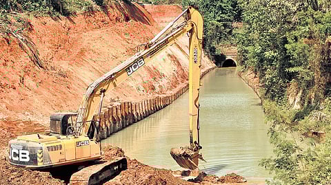 Earthmovers engaged in dredging and bank protection works along Akkulam-Chettuva National Waterway stretch at Vettoor in Thiruvananthapuram on Friday.