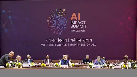 PM Modi addressing the gathering at the AI Impact Summit 2026.