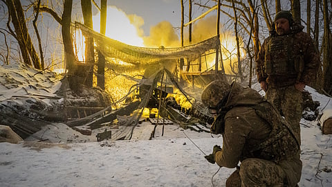 Ukrainian soldiers fire at Russian positions on the front line in the Kharkiv region of Ukraine, Wednesday, Feb. 18, 2026.