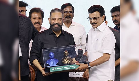MNM president Kamal Haasan presenting a memento to Chief Minister MK Stalin during an event in Madurai on Saturday.