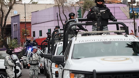 National Guards patrol the area outside of the General Prosecutor's headquarters in Mexico City, Sunday, Feb. 22, 2026, after authorities reported that the Mexican Army killed Jalisco New Generation Cartel leader Nemesio Oseguera, known as "El Mencho."