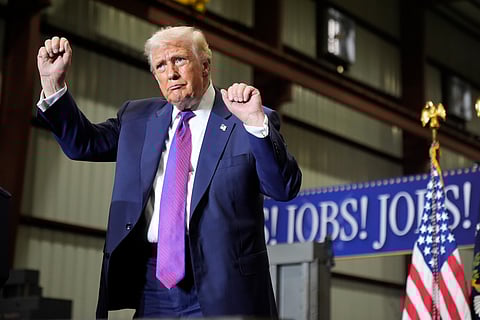 President Donald Trump dances after speaking at a rally at Coosa Steel Corporation in Rome, Ga., Thursday, Feb. 19, 2026.