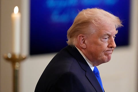 President Donald Trump leaves after an event to proclaim "Angel Family Day" in the East Room of the White House, Monday, Feb. 23, 2026, in Washington.