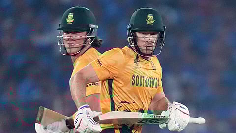 South Africa's Dewald Brevis, left, and batting partner David Miller run between the wickets during the T20 World Cup cricket match between India and South Africa in Ahmedabad, India, Sunday, Feb. 22, 2026. 