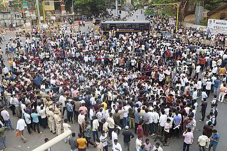 A massive protest erupted in Dharwad on Tuesday as government job aspirants took to the streets.