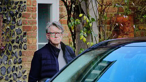 FILE - Peter Mandelson leaves his home in Wiltshire, England, Feb. 20, 2026. 