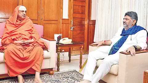 DCM DK Shivakumar called on Suttur Sri Shivarathri Deshikendra Swamiji 
at Suttur Sadan on KR Road in Bengaluru on Tuesday | Express