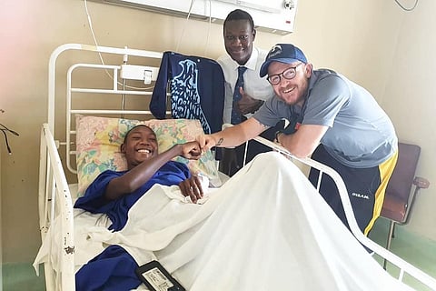  Tanatswa (C) with his elder brother and Zimbabwe opener Tadiwanashe Marumani (R)  