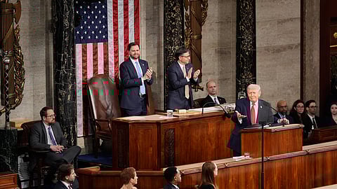 Vice President JD Vance, left, and House Speaker Mike Johnson applaud President Donald Trump during his State of the Union address to a joint session of Congress in the House chamber at the U.S. Capitol in Washington, Tuesday, Feb. 24, 2026.