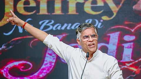 Congress leader Pawan Khera addresses a press briefing at the Congress headquarters, in New Delhi. 