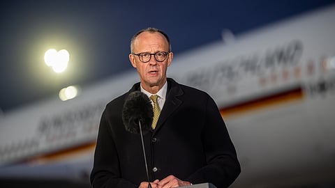 Germany's Federal Chancellor Friedrich Merz (CDU) speaks during a press statement before his departure for China, in Brandenburg, Germany, Tuesday, Feb. 24, 2026.