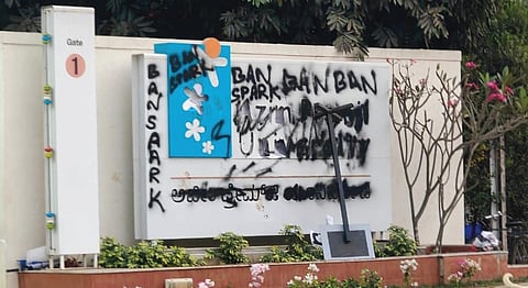 Black paint on the signboard of the Azim Premji University