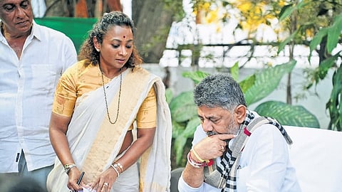 Deputy CM DK Shivakumar, who is also state Congress president, in a discussion with Mudigere MLA Nayana Motamma in Bengaluru on Thursday 