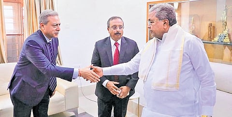 A delegation led by Tata Advanced Systems Chairman Banmali Agrawala greets Chief Minister Siddaramaiah in Bengaluru 