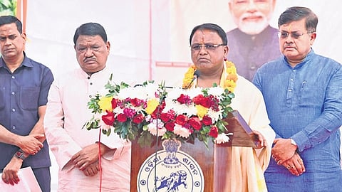 CM Mohan Charan Majhi, flanked by Union Tribal Affairs min Jual Oram and Works min Prithiviraj Harichandan after laying foundation stone for Odisha Bhavan in New Delhi.