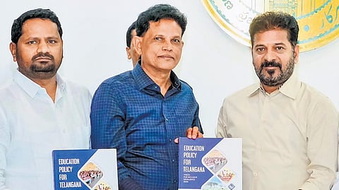 State Education Commission chairman Akunuri Murali, along with others, submits a report on the Telangana education system to Chief Minister A Revanth Reddy at the Integrated Command and Control Centre in Hyderabad on Thursday