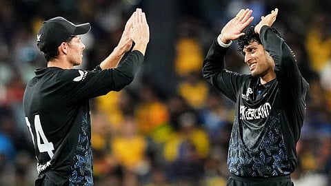 New Zealand's Rachin Ravindra, right, celebrates with captain Mitchel Santner the wicket of Sri Lanka's captain Dasun Shanaka during the T20 World Cup cricket match between Sri Lanka and New Zealand on Wednesday, Feb. 25, 2026.