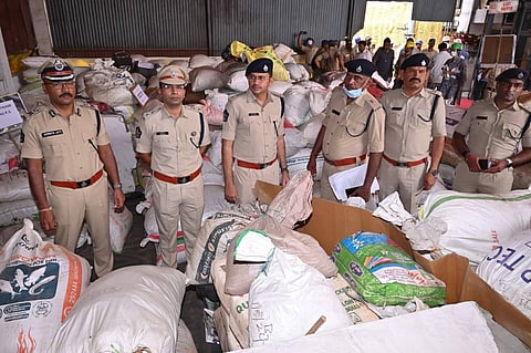  Visakhapatnam Range IG Gopinath Jatti along with Alluri Sitarama Raju District SP Amit Bardar and Anakapalli District SP Tuhin Sinha checking 52,336 kg of seized ganja and 142 litres of hashish oil from 783 cases at the Coastal Waste Management Project in Paravada, Anakapalli district, on Wednesday.