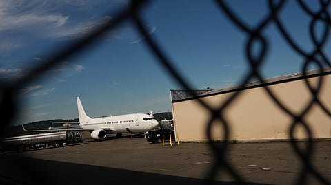 FILE - A U.S. Immigration and Customs Enforcement flight operates out of King County International Airport-Boeing Field, Aug. 23, 2025, in Seattle. 