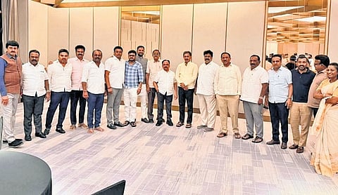 Congress legislators pose for a picture at the birthday party hosted by Magadi MLA HC Balakrishna at a hotel in Bengaluru on Thursday evening.