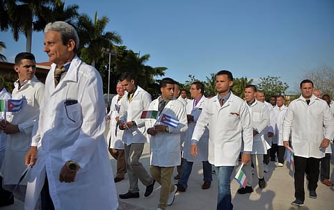 Doctors and nurses of Cuba’s Henry Reeve International Medical Brigade preparing to travel to Italy for medical assistance during the coronavirus pandemic.