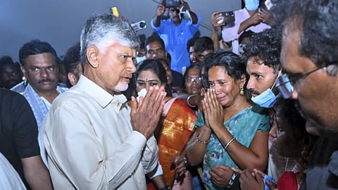 Andhra Chief Minister N Chandrababu Naidu meets bereaved family members of victims of the cracker unit blast at Vetlakpalem, in Kakinada