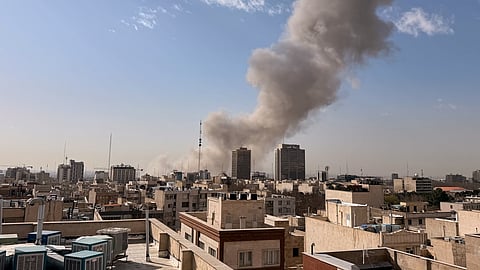 Smoke rises on the skyline after an explosion in Tehran, Iran, Saturday, Feb. 28, 2026.